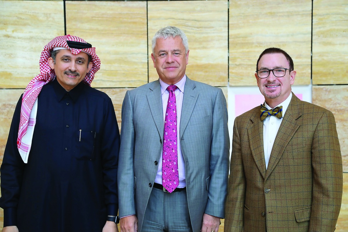(From left) Acting Chief of Medical Informatics at Sidra Dr. Khalid Alyafei; Paul Casterton and Chief Information Officer; Mike LeRoy pose after the clinic received HIMSS certification.