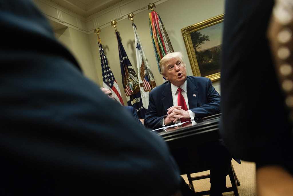 US President Donald Trump speaks before a meeting with health insurance executives in the Roosevelt Room of the White House February 27, 2017 in Washington, DC. AFP / Brendan Smialowski
