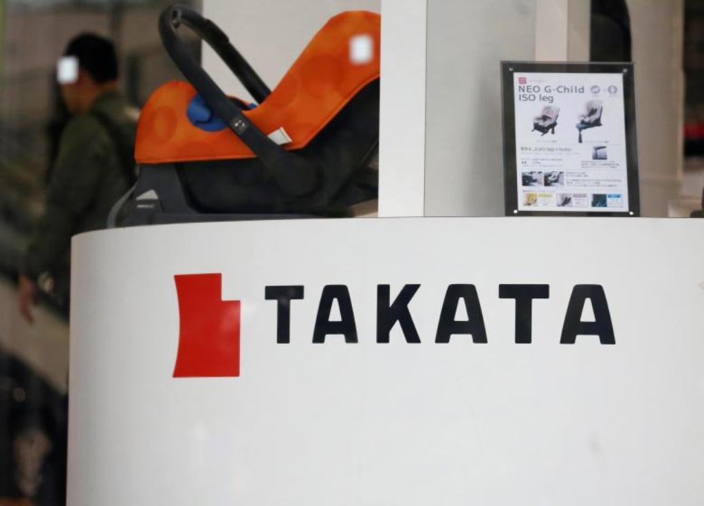 The logo of Takata Corp is seen on its display at a showroom for vehicles in Tokyo, Japan, February 9, 2017. Picture taken February 9, 2017. REUTERS/Toru Hanai.