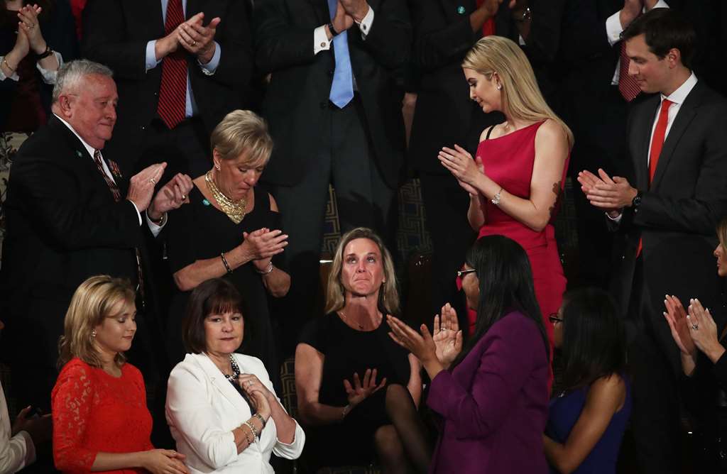 WASHINGTON, DC - FEBRUARY 28: Widow of Fallen Navy Seal, Senior Chief William Owens, Carryn Owens, Ivanka Trump and Jared Kusher attend a joint session of the US Congress with US President Donald Trump on February 28, 2017 in the House chamber of the U.S.