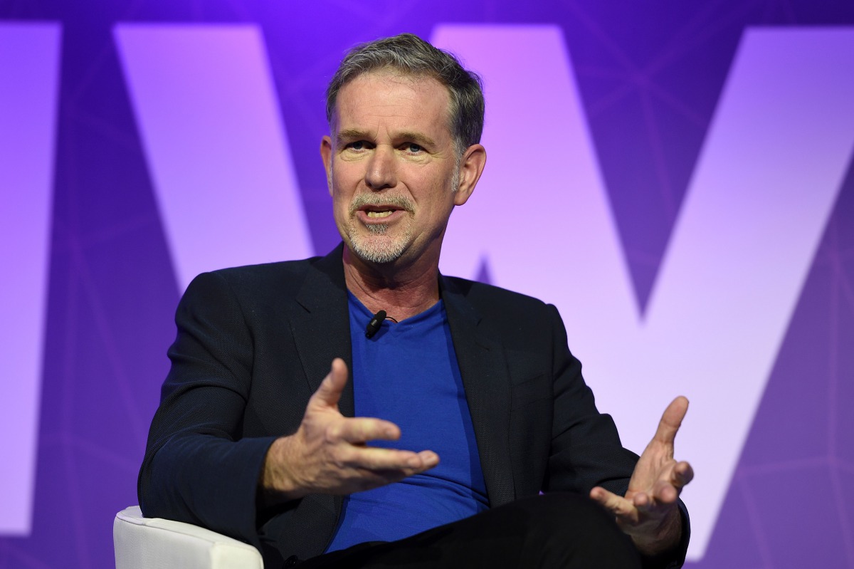 Founder and CEO of Netflix Reed Hastings speaks during a keynote speech at the Mobile World Congress in Barcelona on February 27, 2017. Phone makers will seek to seduce new buyers with artificial intelligence functions and other innovations at the world's