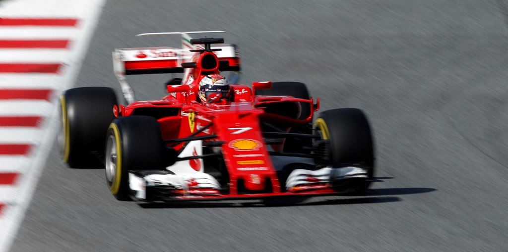 Ferrari's Kimi Raikkonen in action. REUTERS/Albert Gea
