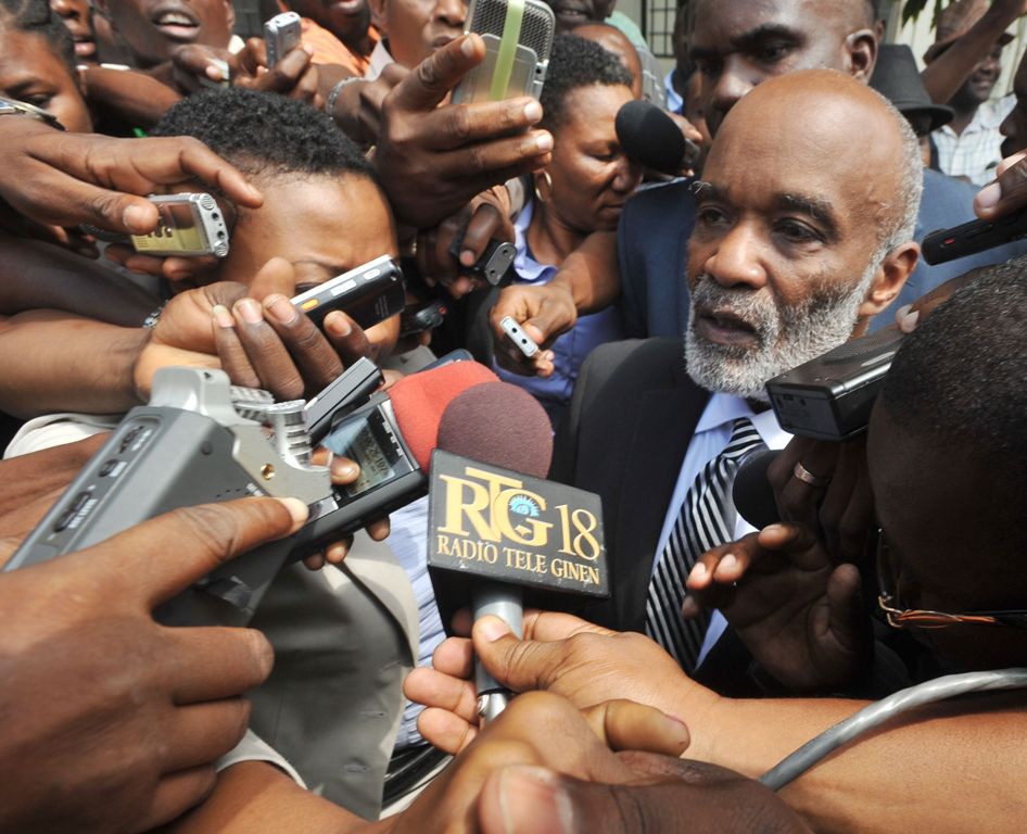 (FILES) This file photo taken on March 7, 2013 shows Former haitian president Rene Preval speaks to the press March 7, 2013 after giving testimony in court regarding the assassination Haitian journalist Jean Dominique in Port-au-Prince.  AFP / Thony BELIZ