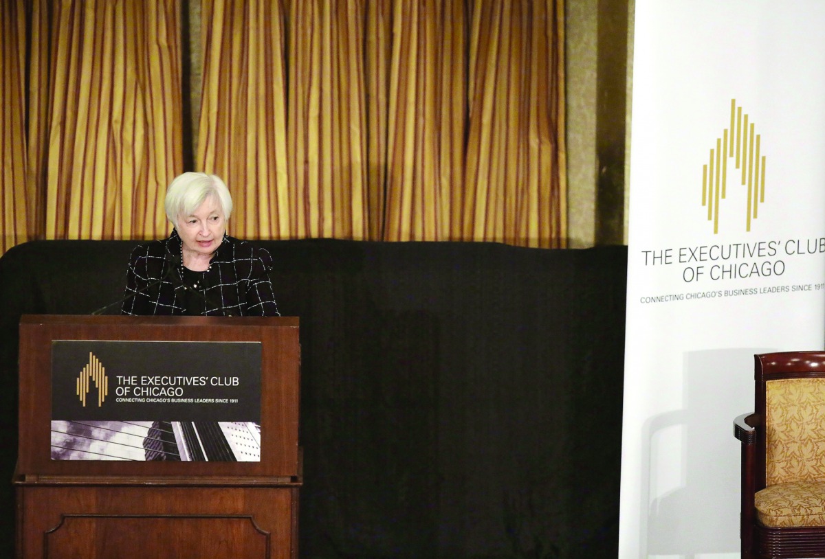 Federal Reserve Board Chairwoman Janet Yellen speaks during a luncheon at the Executives Club of Chicago.  Yellen said that the Federal Reserve will likely raise the benchmark interest rate of 0.75% later this month. 