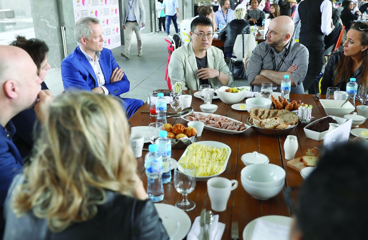 Kim Young-woo of Busan International Film Festival (centre) leads a working breakfast session on Meet the Festivals during day two of Qumra, yesterday.