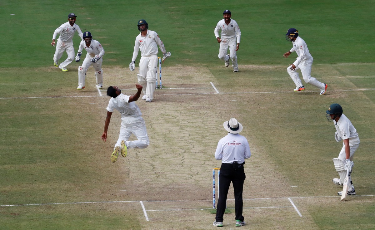 India's Ravichandran Ashwin (3rd L) celebrates with teammates after winning the match. (REUTERS/Danish Siddiqui)