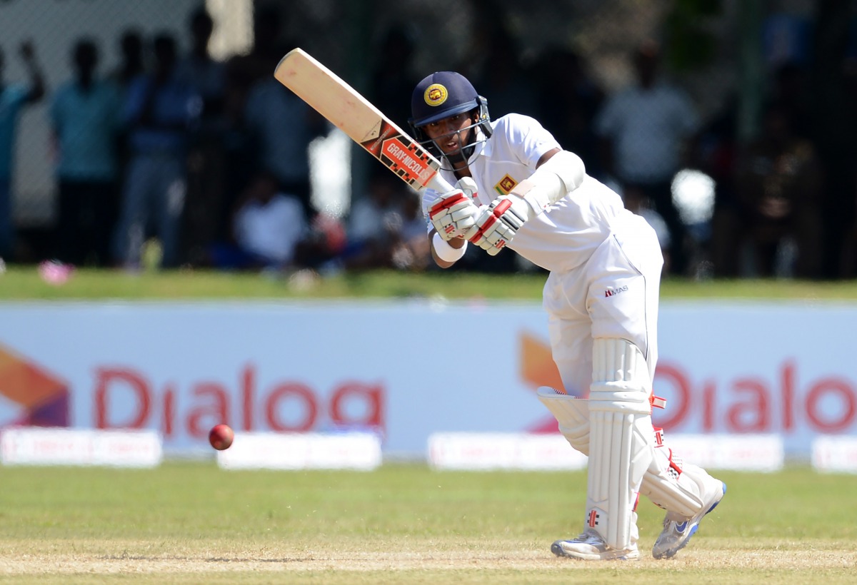 Sri Lankan cricketer Kusal Mendis plays a shot during the first day of the opening Test match between Sri Lanka and Bangladesh at the Galle International Cricket Stadium in Galle on March 7, 2017. (AFP / LAKRUWAN WANNIARACHCHI)