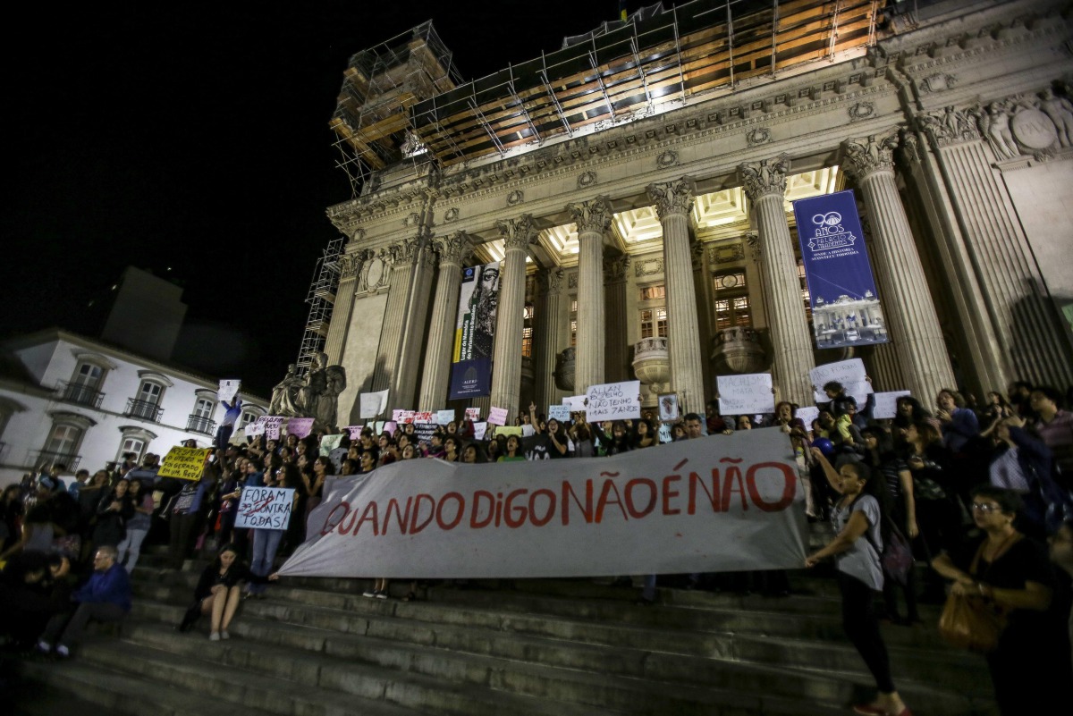 FILE PHOTO: Activists protest after the gang rape of a teenager in the front of Legislative Assembly building in Rio de Janeiro, Brazil 27, May 2016 (EPA / Antonio Lacerda) 