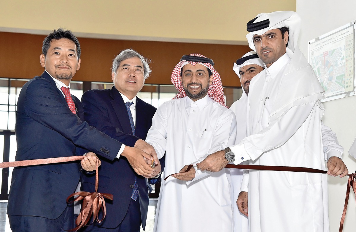 Officials cutting the ribbon at the launch event.