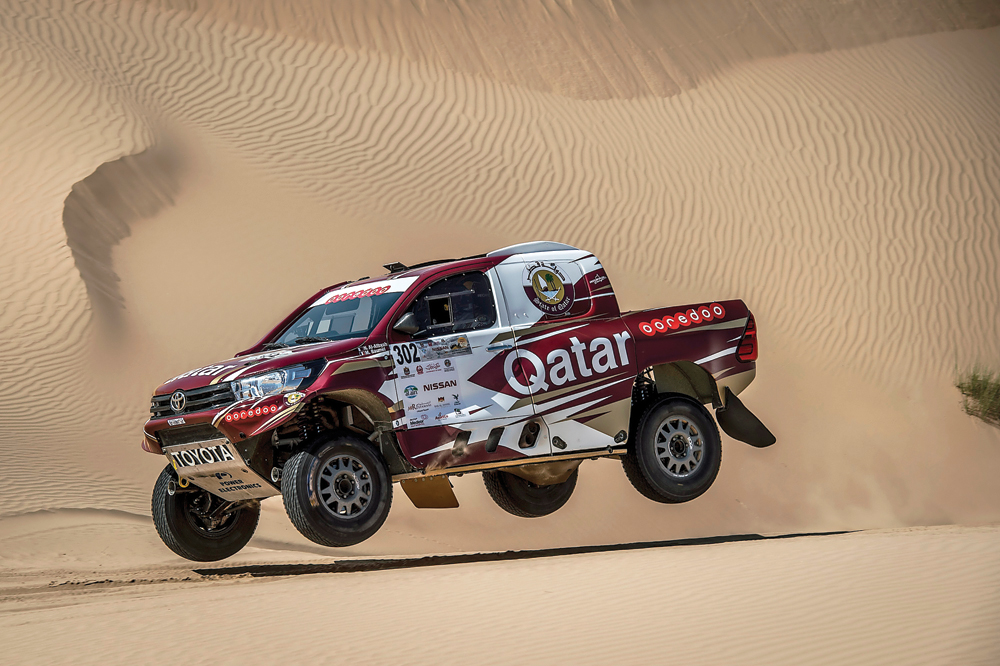 Reigning FIA World Cup champion, Qatari driver Nasser Al Attiyah drives on sand dunes during the first leg of the Dubai International Baja yesterday.