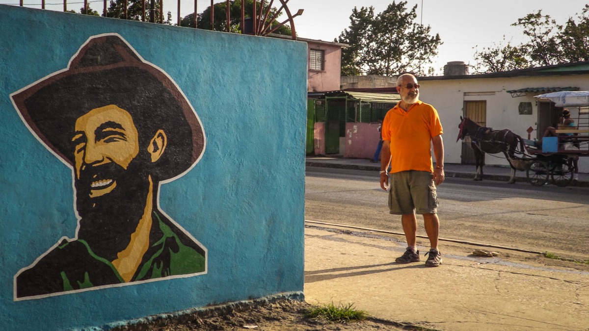 Cuban writer Leonardo Padura stands on a street of the Mantilla neighbourhood, Havana on February 7, 2017. AFP / Adalberto Roque