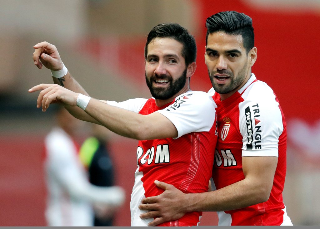 Monaco's Joao Moutinho reacts after scoring with teammate Radamel Falcao. REUTERS/Eric Gaillard
