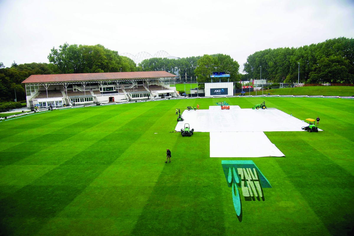 The covers lay over the wicket on final day of the first Test between New Zealand and South Africa in Dunedin yesterday. 