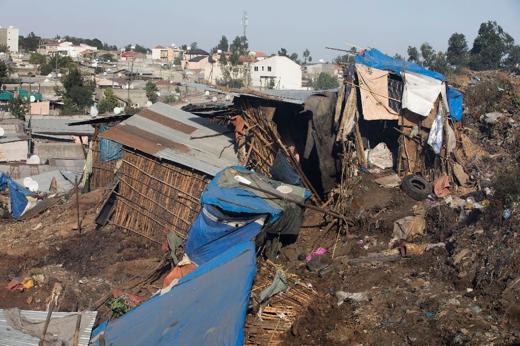 Damaged dwellings after a landslide in the main city dump of Addis Ababa (AFP Photo/ZACHARIAS ABUBEKER).