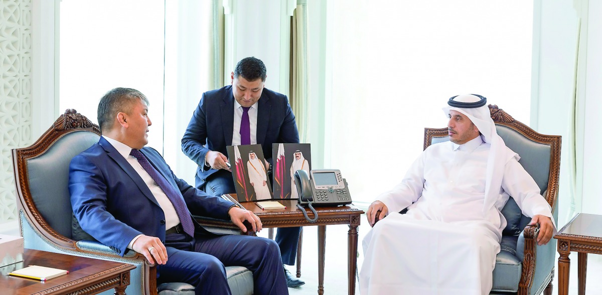 Prime Minister and Interior Minister H E Sheikh Abdullah bin Nasser bin Khalifa Al Thani with Minister of Economy and Trade of the Republic of Kyrgyzstan, Kojoshev Arzybek, in Doha yesterday. During the meeting, they discussed cooperation between the two 