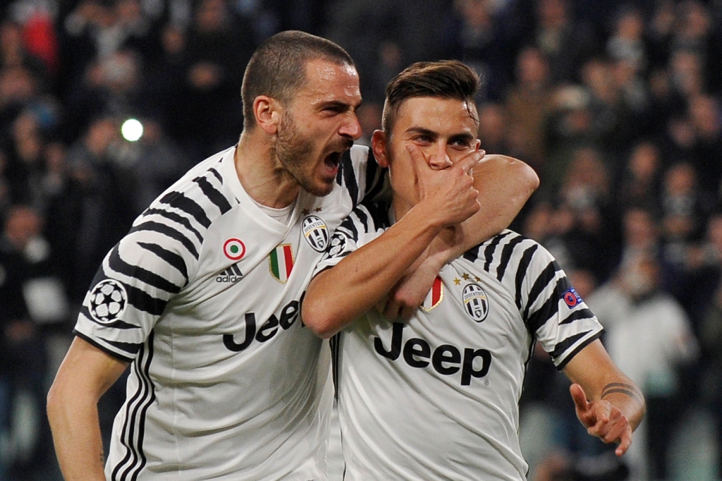  Juventus' Paulo Dybala celebrates scoring their first goal with Leonardo Bonucci Reuters / Giorgio Perottino
