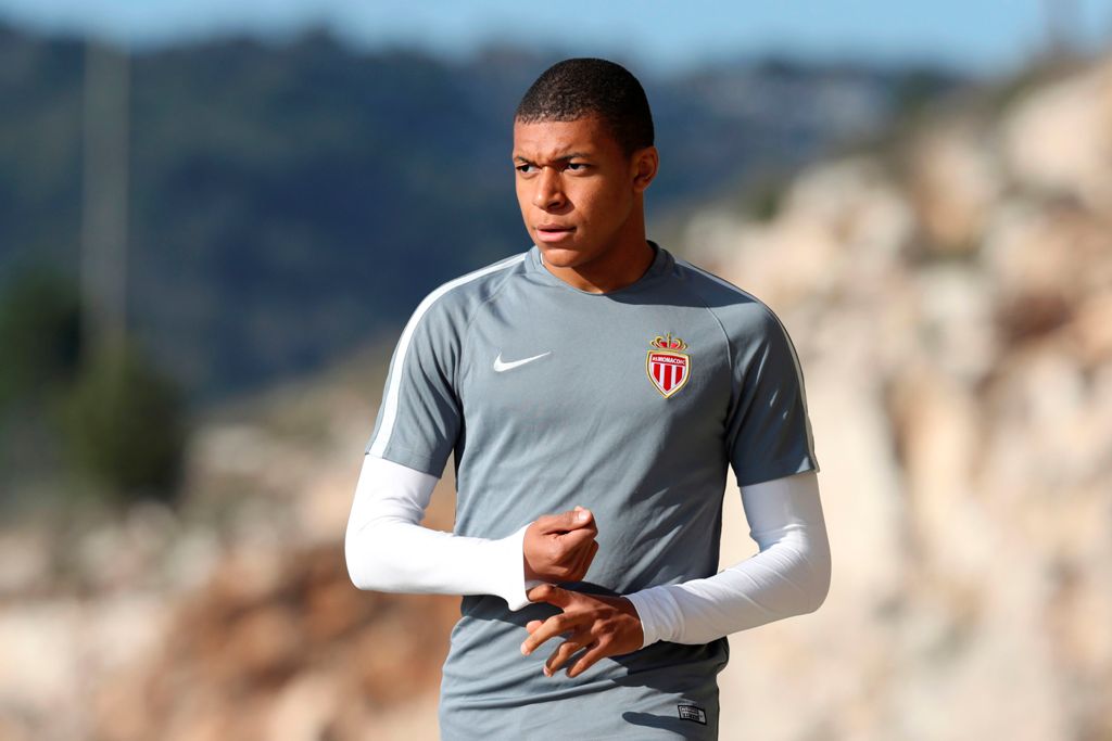 Monaco's French forward Kylian Mbappe Lottin arrives for a training session on the eve of their UEFA Champions League football match Monaco against Manchester City on March 14, 2017 at the 