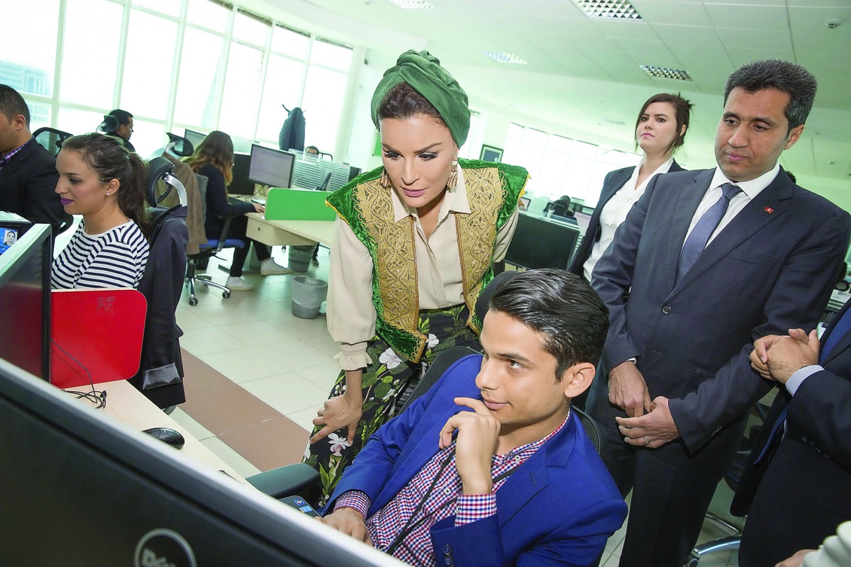 H H Sheikha Moza bint Nasser visiting the Vermeg Company in Tunisia.