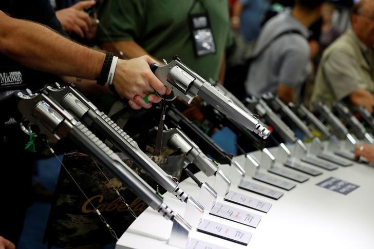 File photo of attendees visiting the trade booths during the National Rifle Association's annual meeting in Louisville, Kentucky. Reuters 