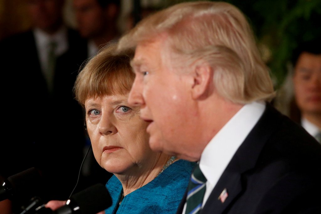 Germany's Chancellor Angela Merkel and U.S. President Donald Trump hold a joint news conference in the East Room of the White House in Washington, U.S., March 17, 2017. REUTERS/Jonathan Ernst 
