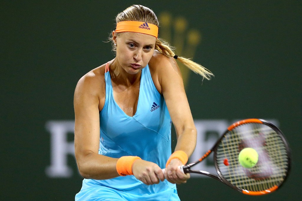 Kristina Mladenovic of France returns ashot to Elena Vesnina of Russia during the semifinals of the BNP Paribas Open at the Indian Wells Tennis Garden on March 17, 2017 in Indian Wells, California. Matthew Stockman/AFP
