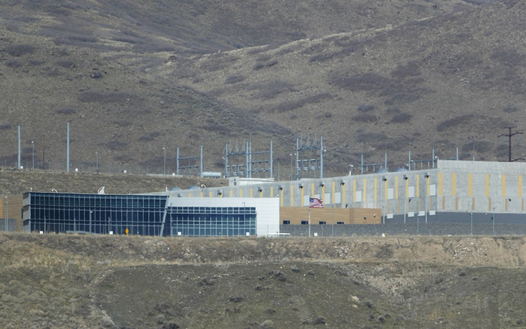 An American flag flies in front of the entrance of the NSA's Utah data collection center on March 17, 2017 in Bluffdale, Utah. George Frey/Getty Images/AFP