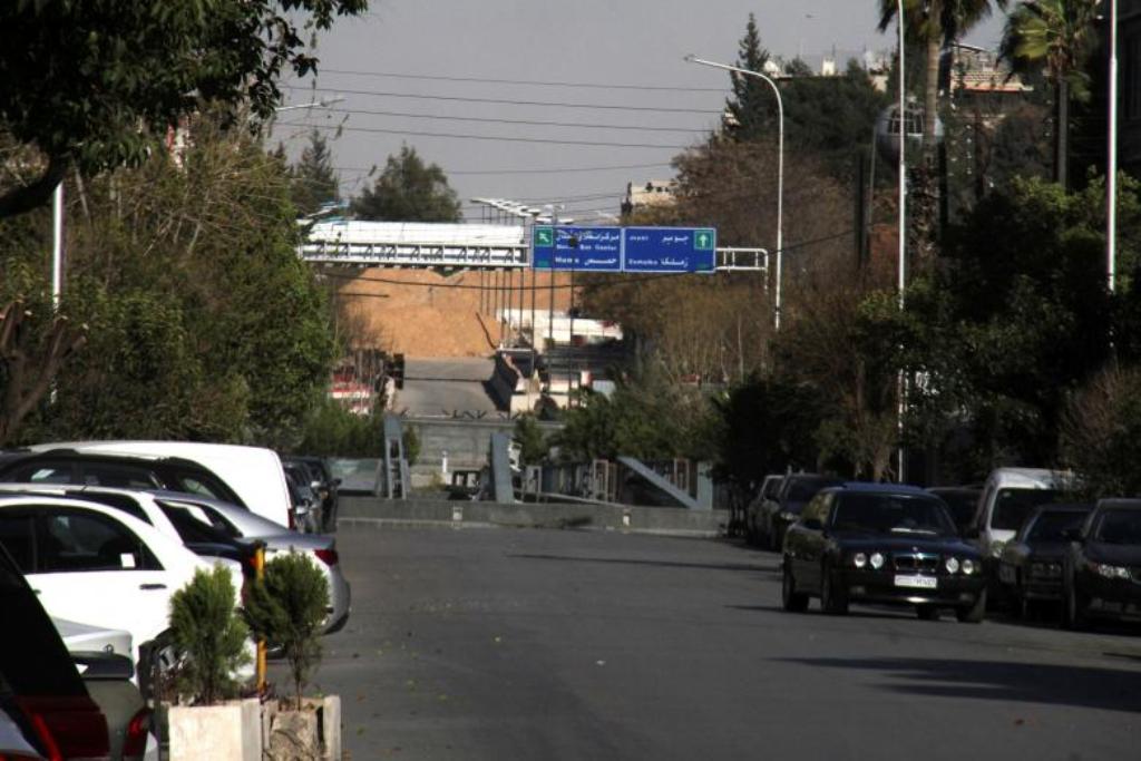 A road sign that shows the direction to Jobar district is pictured in the east of the capital Damascus, in this handout picture provided by SANA on March 19, 2017, Syria. SANA/Handout via REUTERS.