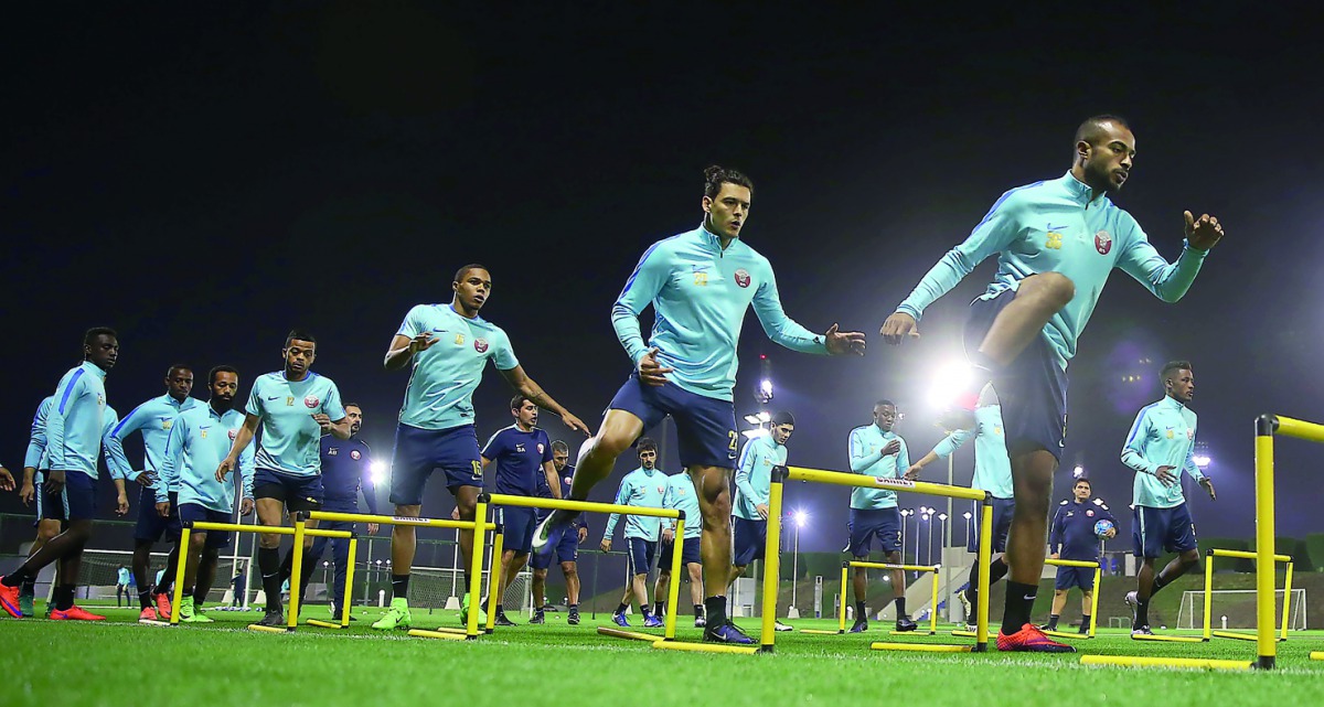 Qatar national team players taking part in a training session under the watchful eyes of coach Jorge Fossati in Doha, on the eve of their FIFA 2018 World Cup qualifying match against Group A leaders Iran. 