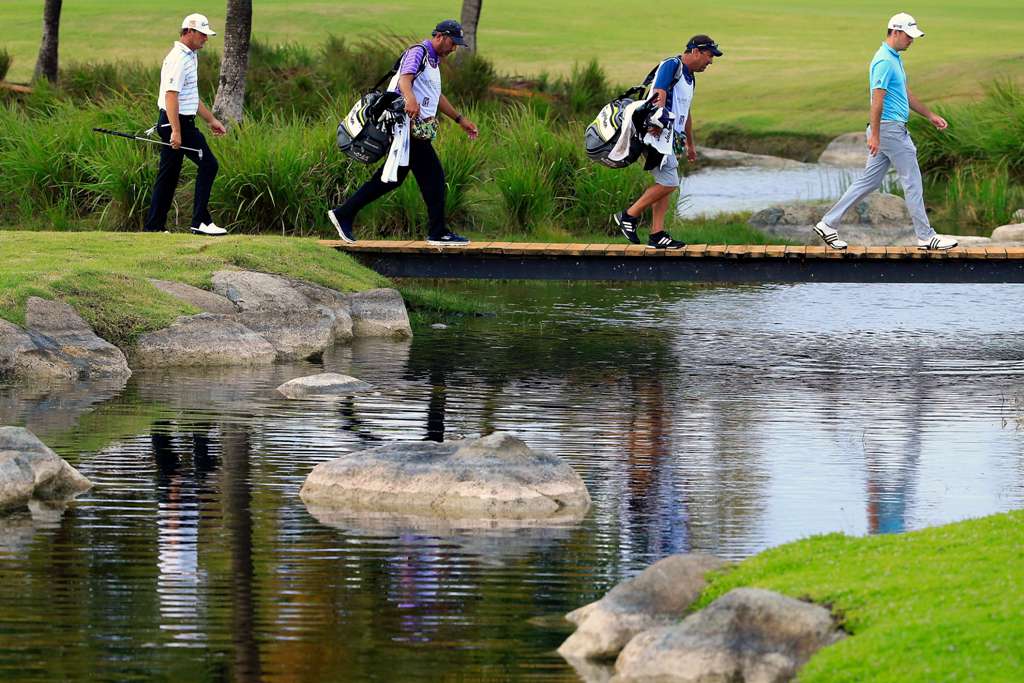 Alex Cejka (L) of Germany and Nick Taylor (R) of Canada walk up to the 13th green during the second round of the Puerto Rico Open at Coco Beach on March 24, 2017 in Rio Grande, Puerto Rico. Michael Cohen/AFP
