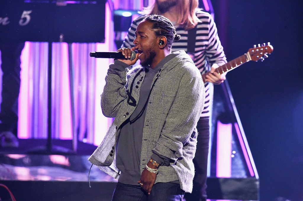 (FILES) This file photo taken on November 19, 2016 shows rapper Kendrick Lamar onstage during the 2016 American Music Awards at Microsoft Theater on November 20, 2016 in Los Angeles, California. AFP / KEVIN WINTER