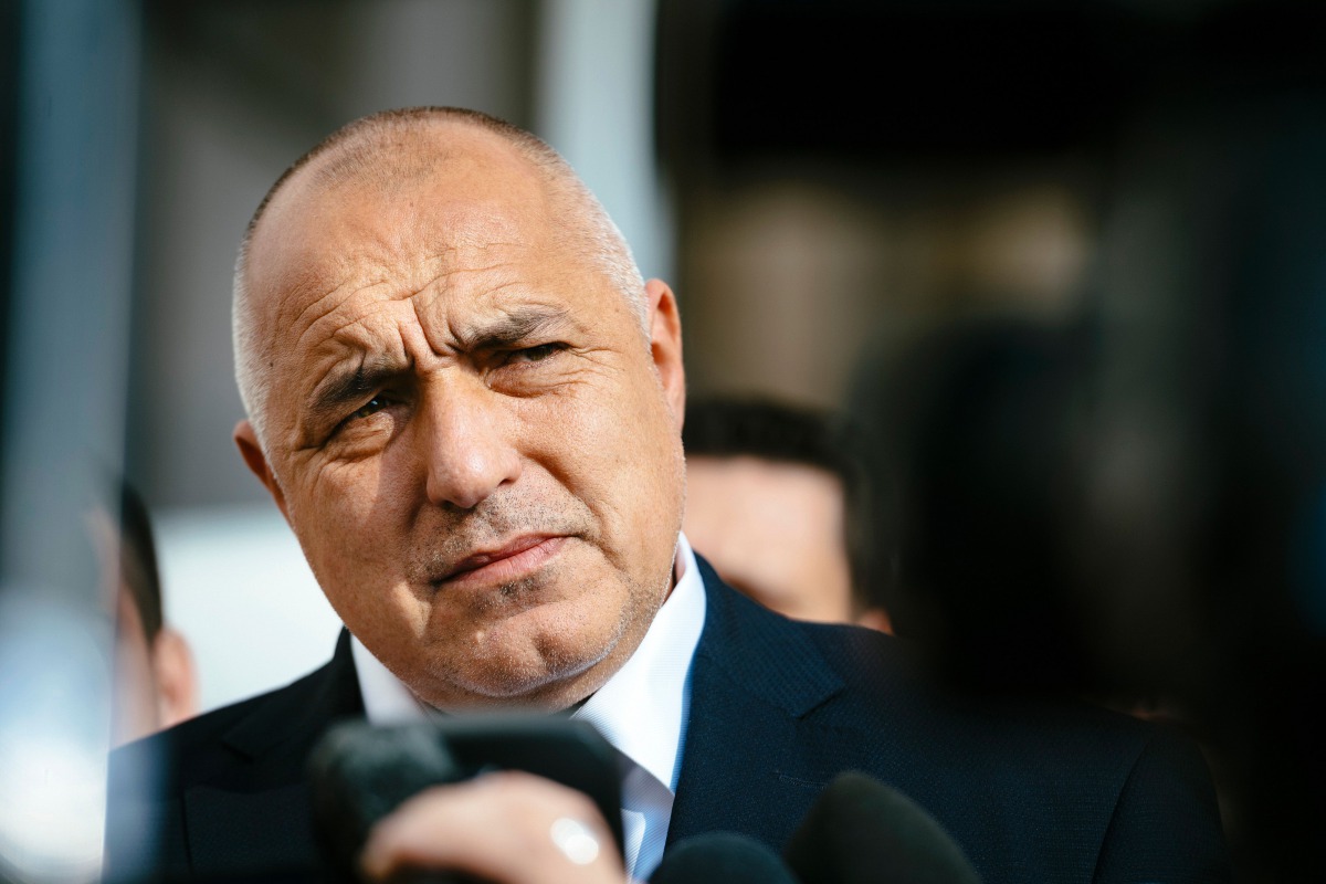 Head of the centre-right GERB party and former prime minister Boyko Borisov speaks to journalists at a polling station in Sofia on March 26, 2017, during the country's parliamentary election. AFP / Dimitar Dilkoff