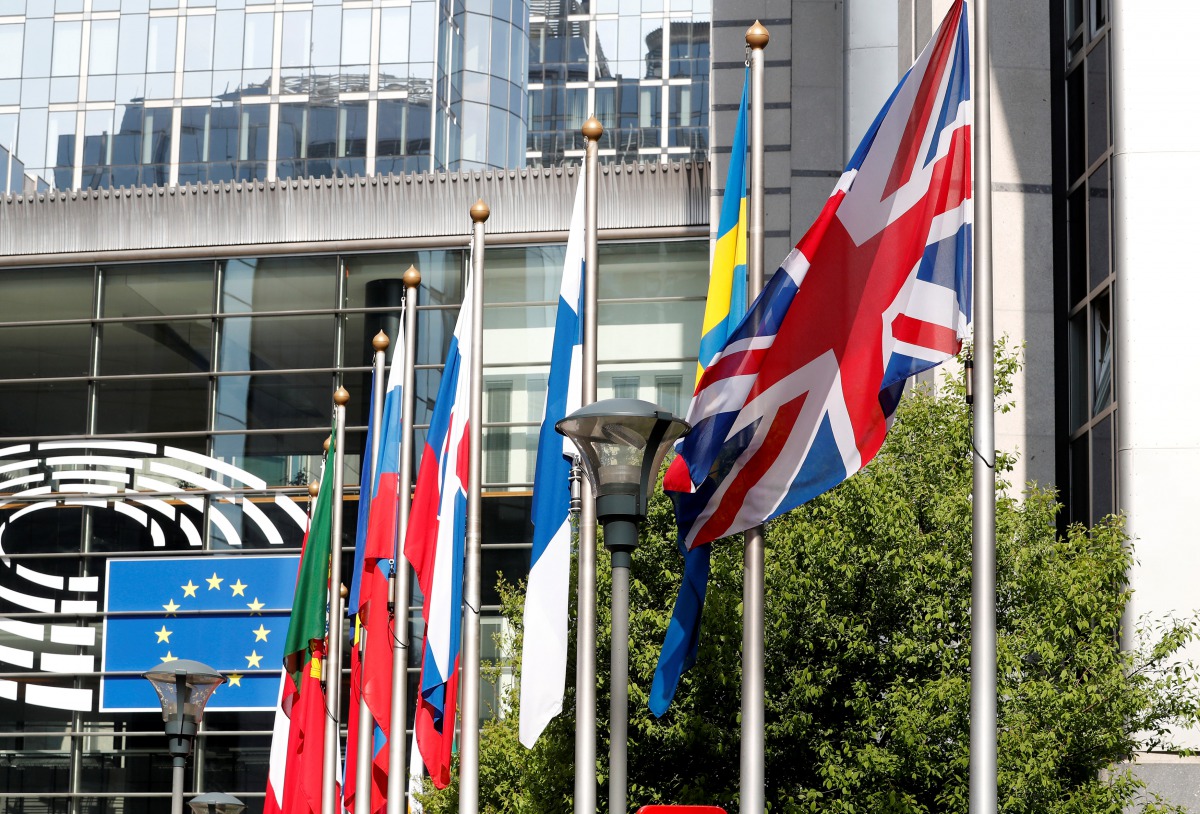 A British flag flies at the entrance of the European Parliament in Brussels, Belgium, March 28, 2017. REUTERS/Yves Herman