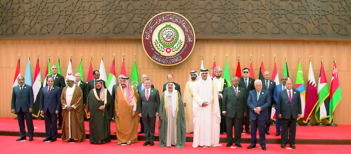 Emir H H Sheikh Tamim bin Hamad Al Thani with other Arab leaders at the 28th Ordinary Session of Arab League summit held at the King Hussein bin Talal Convention Centre in the Dead Sea area in Jordan, yesterday.