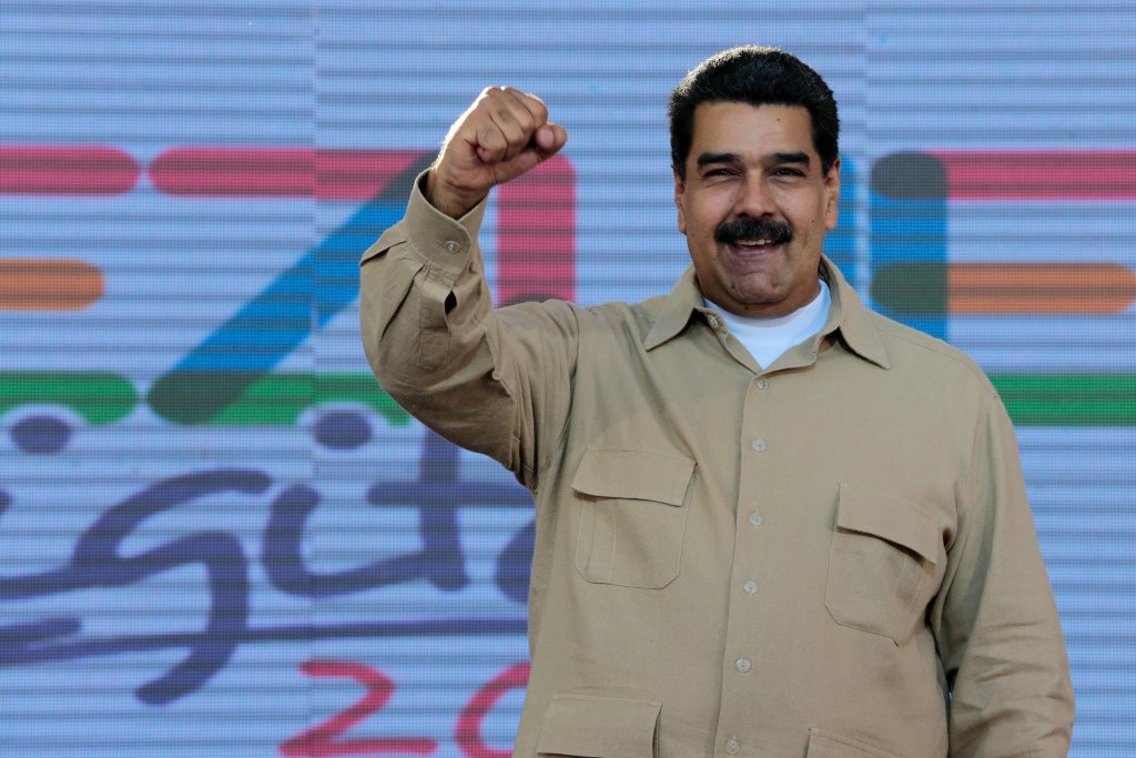 Venezuela's President Nicolas Maduro gestures during a meeting with supporters in Caracas, Venezuela March 31, 2017. Miraflores Palace