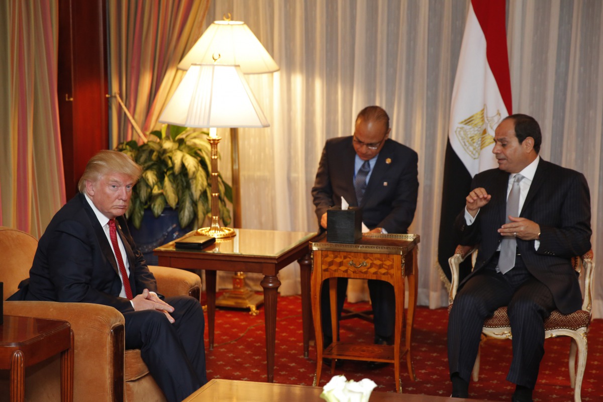 This file photo taken on September 20, 2016 shows then-Republican presidential candidate Donald Trump (L) looking on as Egyptian President Abdel Fattah el-Sisi speaks during a meeting at the Plaza Hotel in New York. (AFP / DOMINICK REUTER)