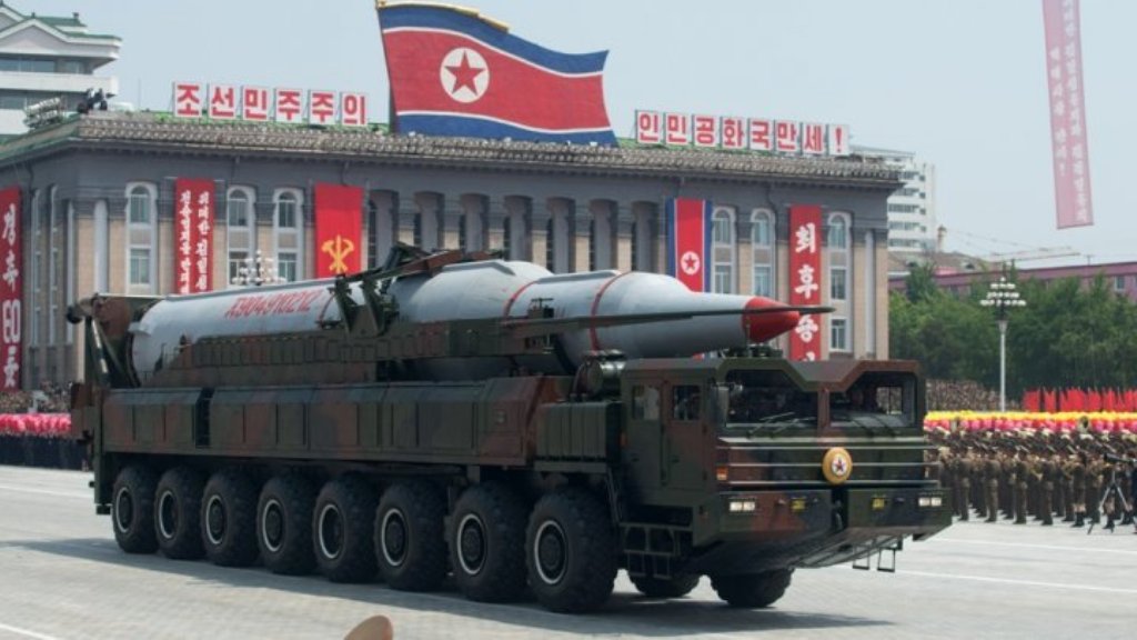 © Ed Jones / AFP | A North Korean Taepodong-class missile is displayed during a military parade past Kim Il-Sung square marking the 60th anniversary of the Korean war armistice in Pyongyang on July 27, 2013.