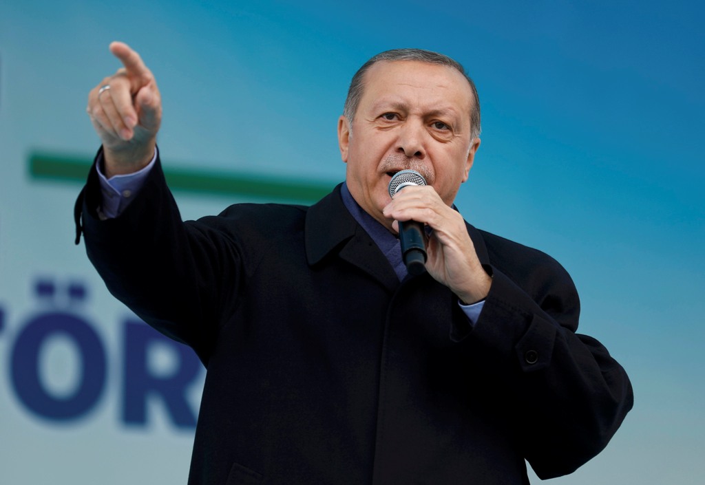 Turkish President Tayyip Erdogan addresses his supporters during a rally for the upcoming referendum in the Black Sea city of Rize, Turkey, April 3, 2017. REUTERS/Umit Bektas
