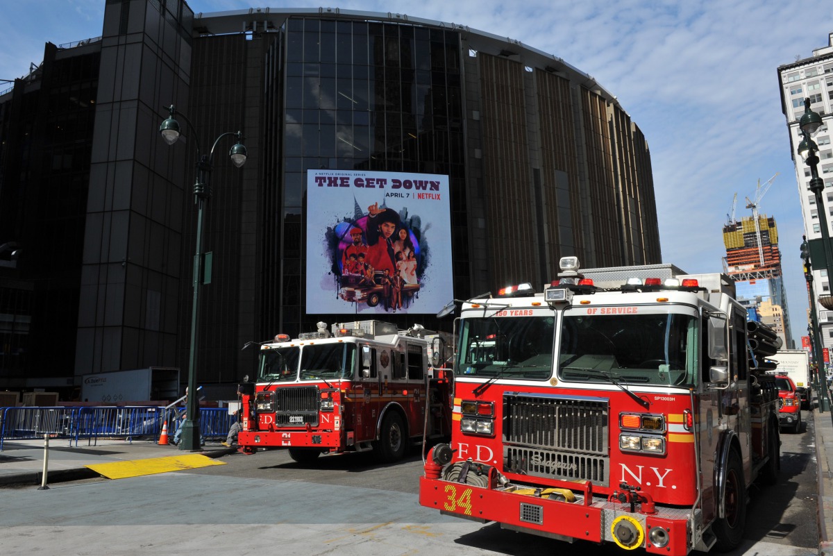New York City firefighters stand by near Penn Station in New York April 3, 2017 after responding to a derailment of a NJ Transit train at Penn Station this morning. NJ TRANSIT said all 1,200 passengers on board were offloaded with only 4 minor injuries. A