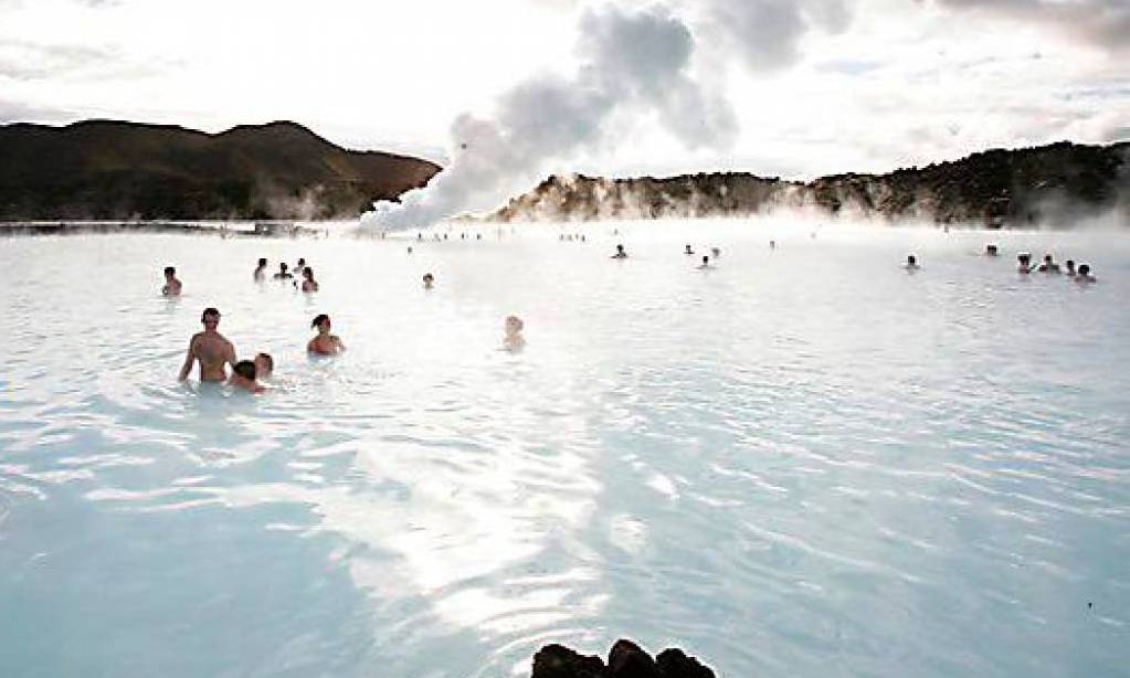 Bathers swim in the geothermal hot springs at Iceland's Blue Lagoon near Grindavik. Bob Strong / Reuters

