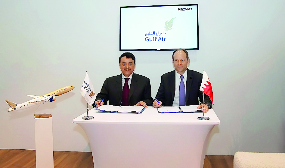 Gulf Air CEO Maher Salman Al Musallam (left) and Recaro CEO and Shareholder Mark Hiller at the signing ceremony in Aircraft Interiors Expo in Hamburg, Germany.