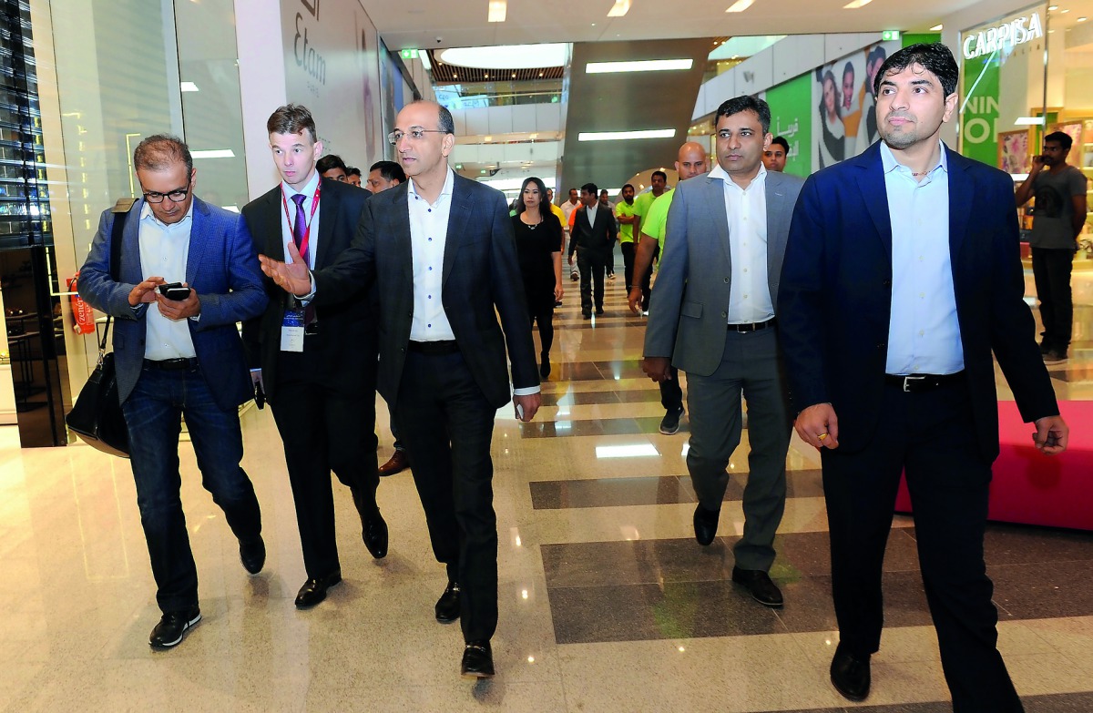 Officials of Apparel Group, Nilesh Ved (third left), Chairman, Athish (second right), Group Finance Manager; Sunil Thakkar (right), General Manager, Apparel Qatar; with Trevor Hill (second left), General Manager, Doha Festival City (DFC), during a media t