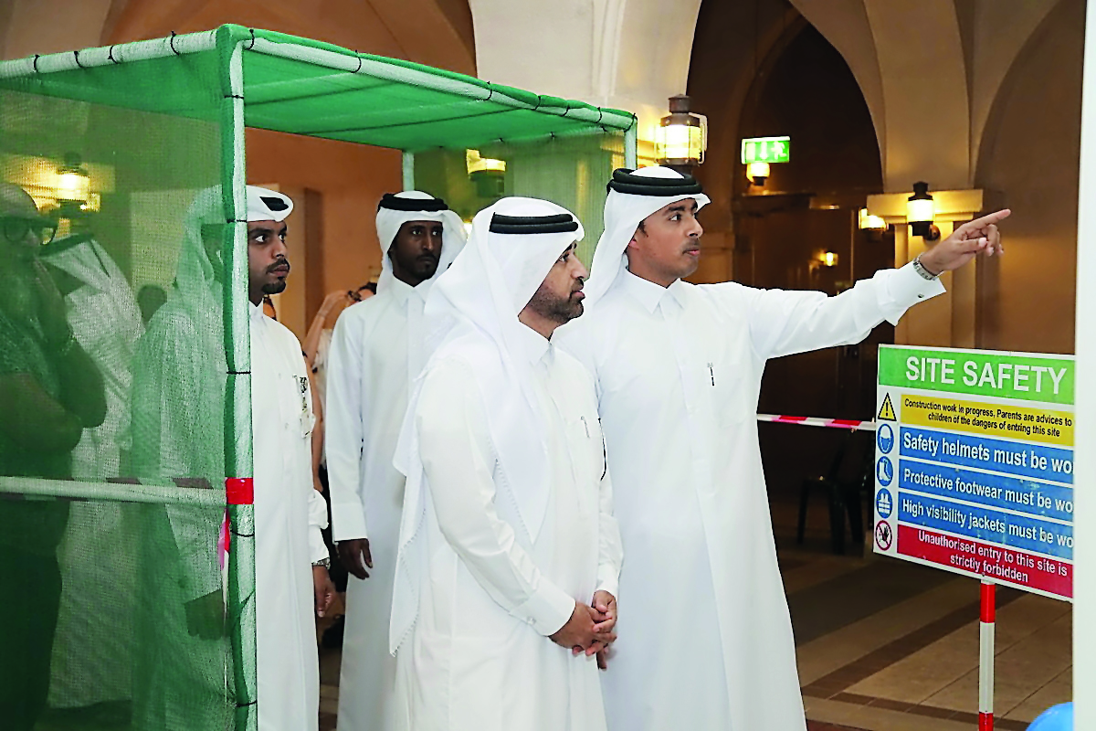 Guests viewing the exhibition at Katara Art Center.