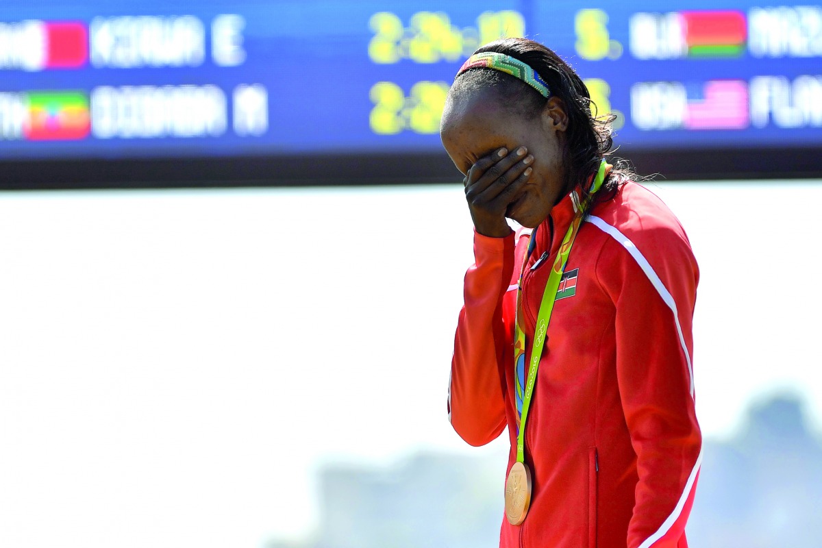 Kenya's Jemima Jelagat Sumgong reacts during the podium ceremony of the Women's Marathon during the athletics event at the Rio 2016 Olympic Games in this file photo. Sumgong, the first Kenyan woman to win Olympic marathon gold when she triumphed at Rio in