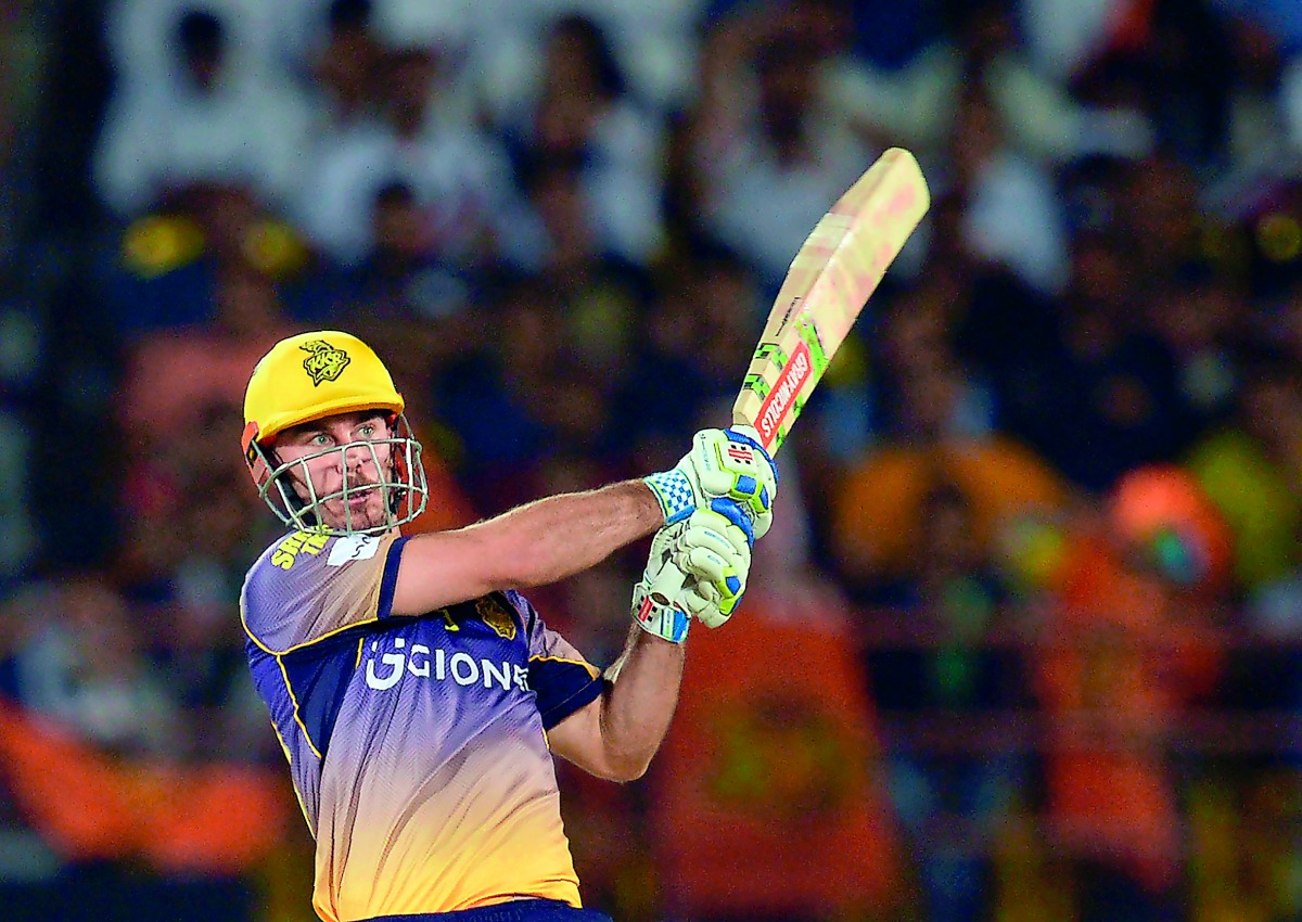 Kolkata Knight Riders batsman Chris Lynn plays a shot  during the 2017 Indian Premier League (IPL) Twenty20 cricket match against Gujarat Lions  at the Saurashtra Cricket Association Stadium in Rajkot.