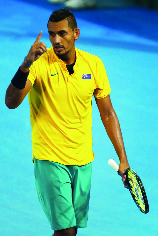 Nick Kyrgios of Australia reacts during his Davis Cup world group quarter-final match against John Isner of the US at the Pat Rafter Arena in Brisbane yesterday.