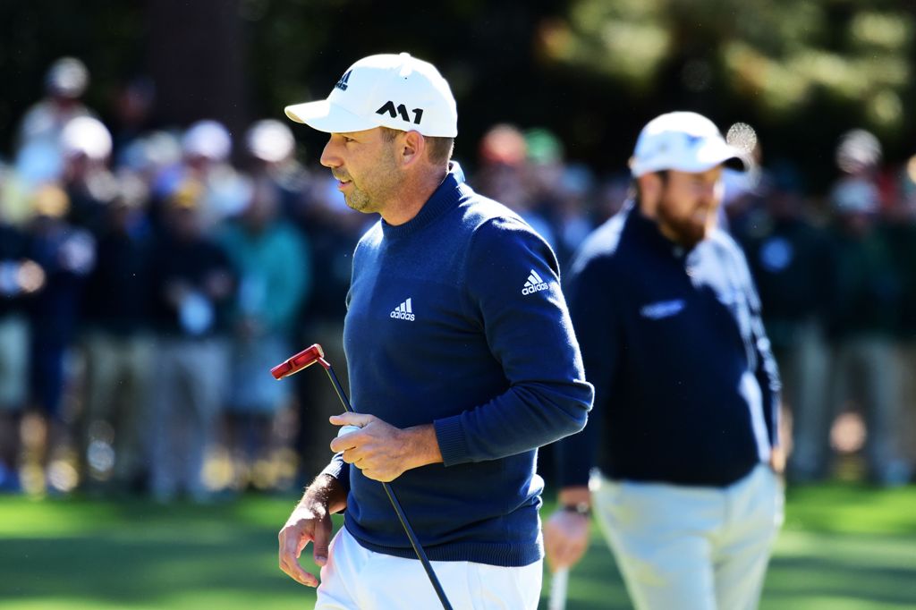 Sergio Garcia of Spain and Shane Lowry of Ireland stand on the first green during the second round of the 2017 Masters Tournament at Augusta National Golf Club on April 7, 2017 in Augusta, Georgia. Harry How/AFP