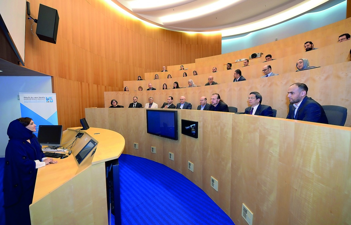 Dr Amal Al Malki discusses new programmes at a faculty meeting.