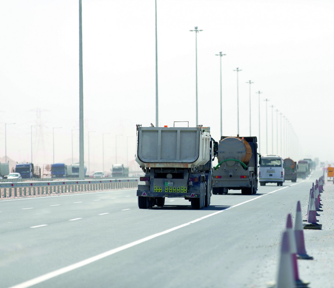 Vehicles passing through a newly-opened stretch of Orbital Highway.