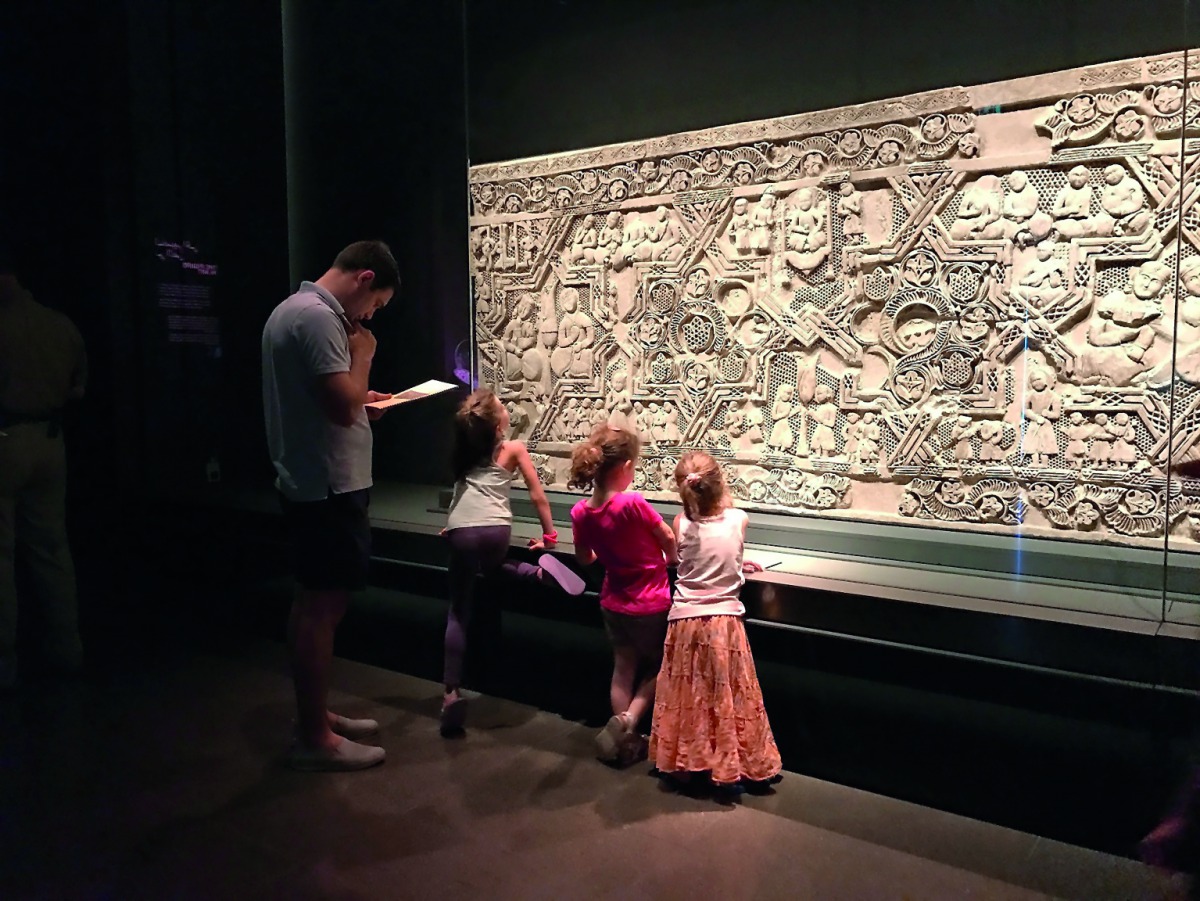 Families taking part in an educational activity.