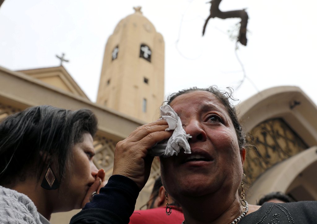 A relative of one of the victims reacts after a church explosion killed at least 21 in Tanta, Egypt, April 9, 2017. REUTERS/Mohamed Abd El Ghany
